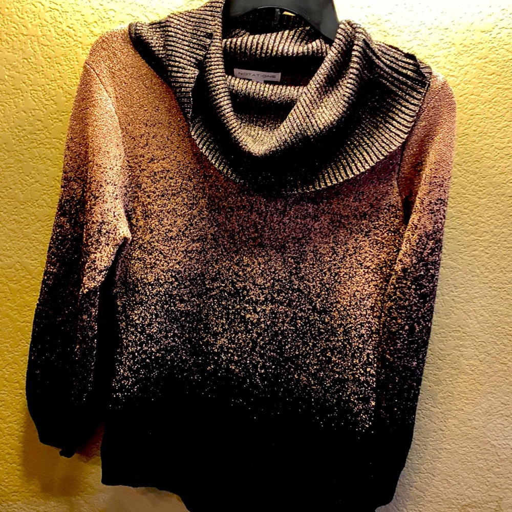 Women’s shimmery rose gold and black sweater